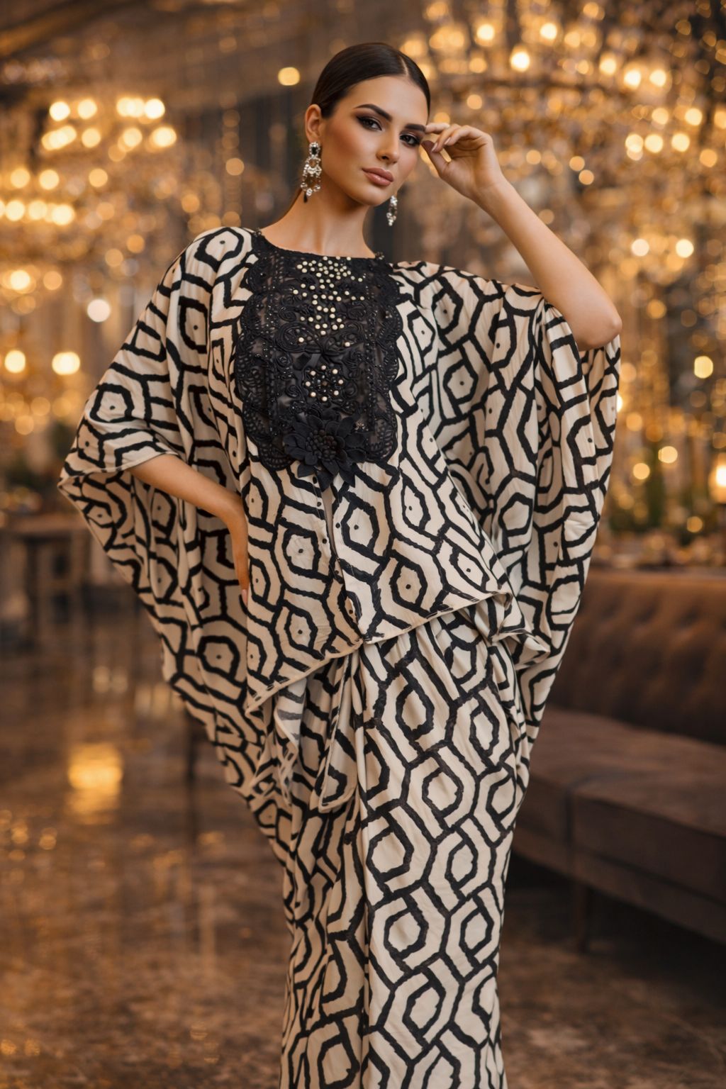 Draped top with handle embellishment